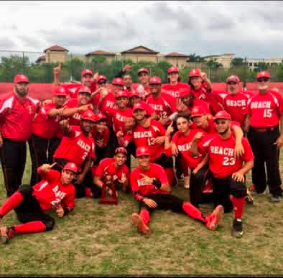 Juan Cordero coaching baseball team at Monsignor Edward Pace High School
